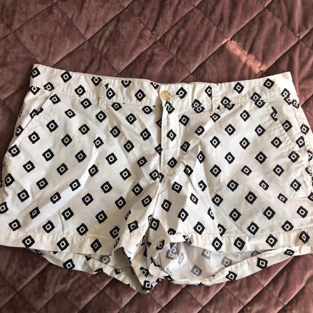 White and black print shorts